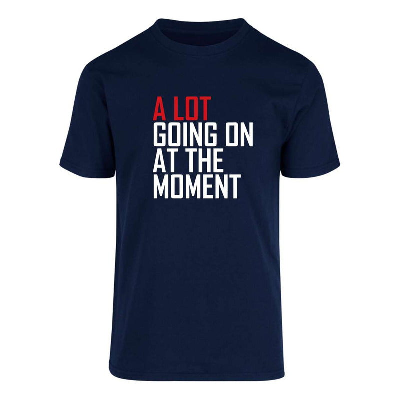 Playera unisex KreaLab de Taylor Swift con diseño "A Lot Going On At The Moment" en color neutro, vista frontal.